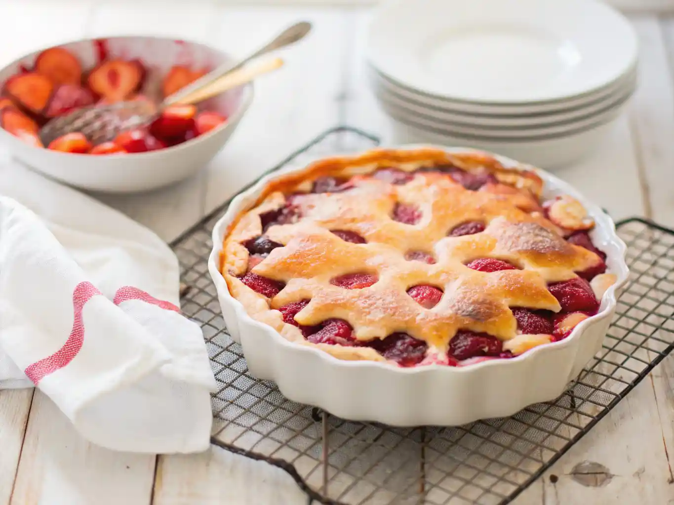 Freshly baked strawberry dessert cooling on a rack, perfect for summer strawberry cake recipes