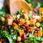 Hearty Chickpea Kale and Butternut Squash Salad, protein-rich chickpeas, and sweet dried cranberries.