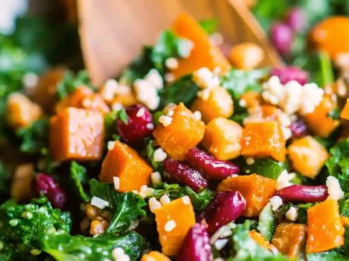 Hearty Chickpea Kale and Butternut Squash Salad, protein-rich chickpeas, and sweet dried cranberries.