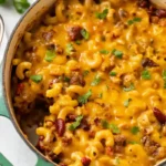 Creamy chili mac with homemade chili and macaroni cheese in a bowl.