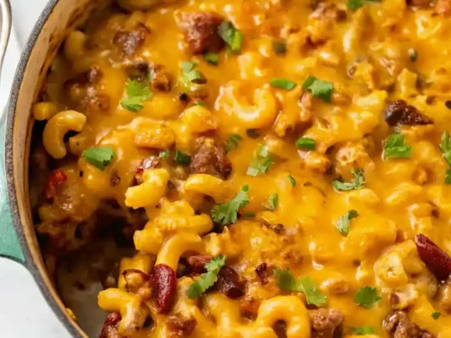 Creamy chili mac with homemade chili and macaroni cheese in a bowl.