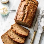 Delicious homemade zucchini bread with walnuts and a warm cinnamon flavor.