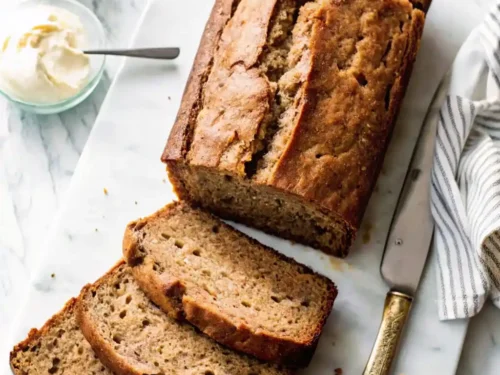 Delicious homemade zucchini bread with walnuts and a warm cinnamon flavor.