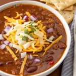 Delicious quick and easy chili recipe in a bowl with toppings.