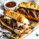 Image of two Crockpot French Dip Sandwiches
