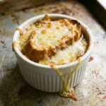 French Onion Soup with Cheesy Bread Topping