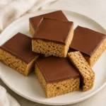 Peanut-butter crisp-rice Scotcheroos with chocolate-butterscotch topping.